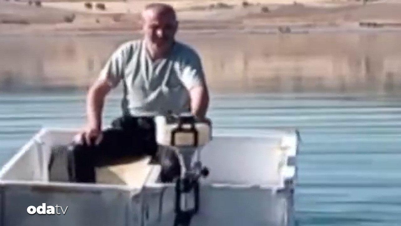 Motor taktığı buzdolabını kayık yaptı: Gölde tur attı